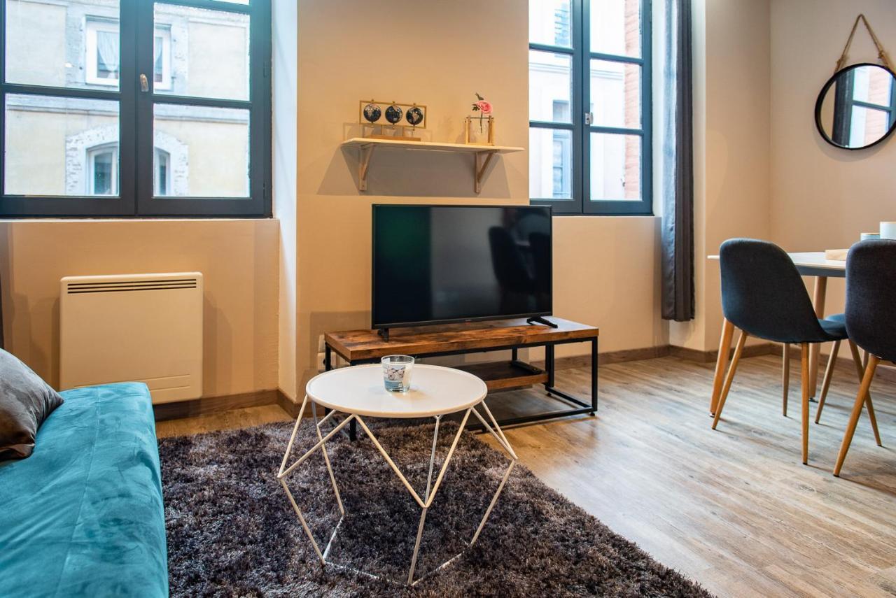 Immeuble Hyper Centre Apartment มงโตบ็อง ภายนอก รูปภาพ