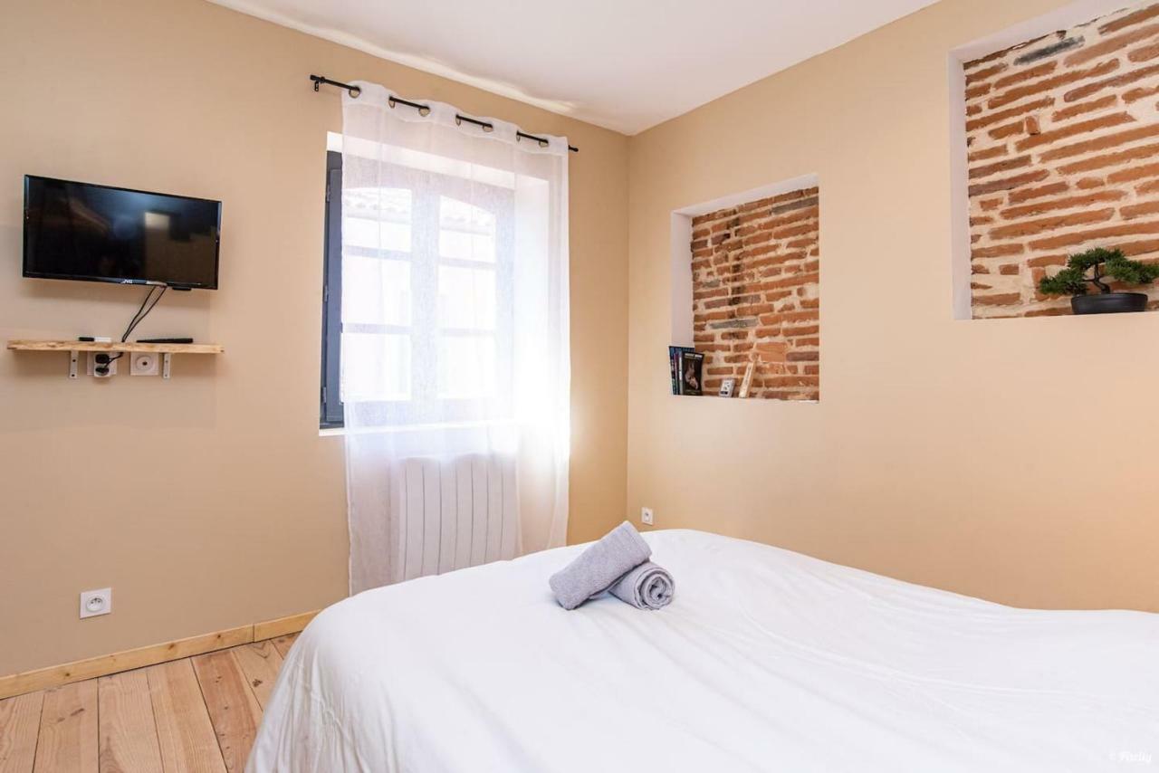 Immeuble Hyper Centre Apartment มงโตบ็อง ภายนอก รูปภาพ