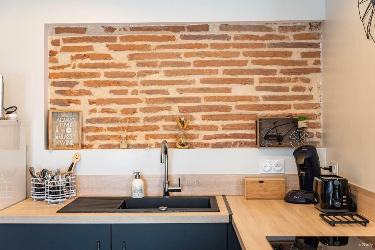 Immeuble Hyper Centre Apartment มงโตบ็อง ภายนอก รูปภาพ