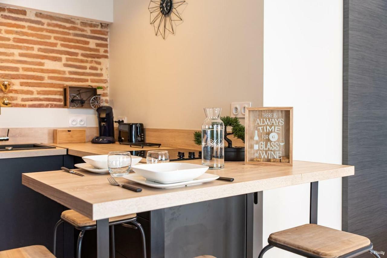 Immeuble Hyper Centre Apartment มงโตบ็อง ภายนอก รูปภาพ